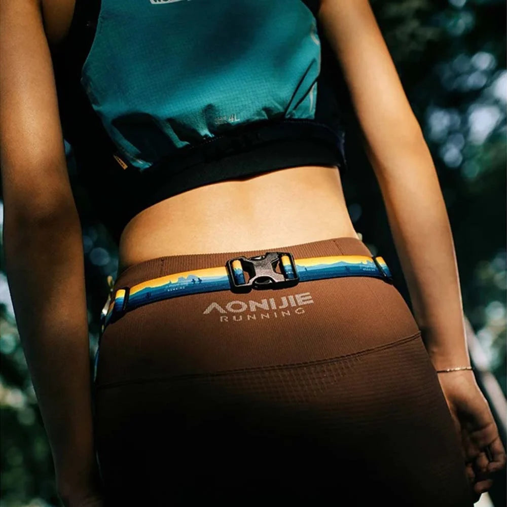 AONIJIE E4436 Portadorsal Reflectante para Running – Cinturón Elástico Unisex para Maratón y Triatlón